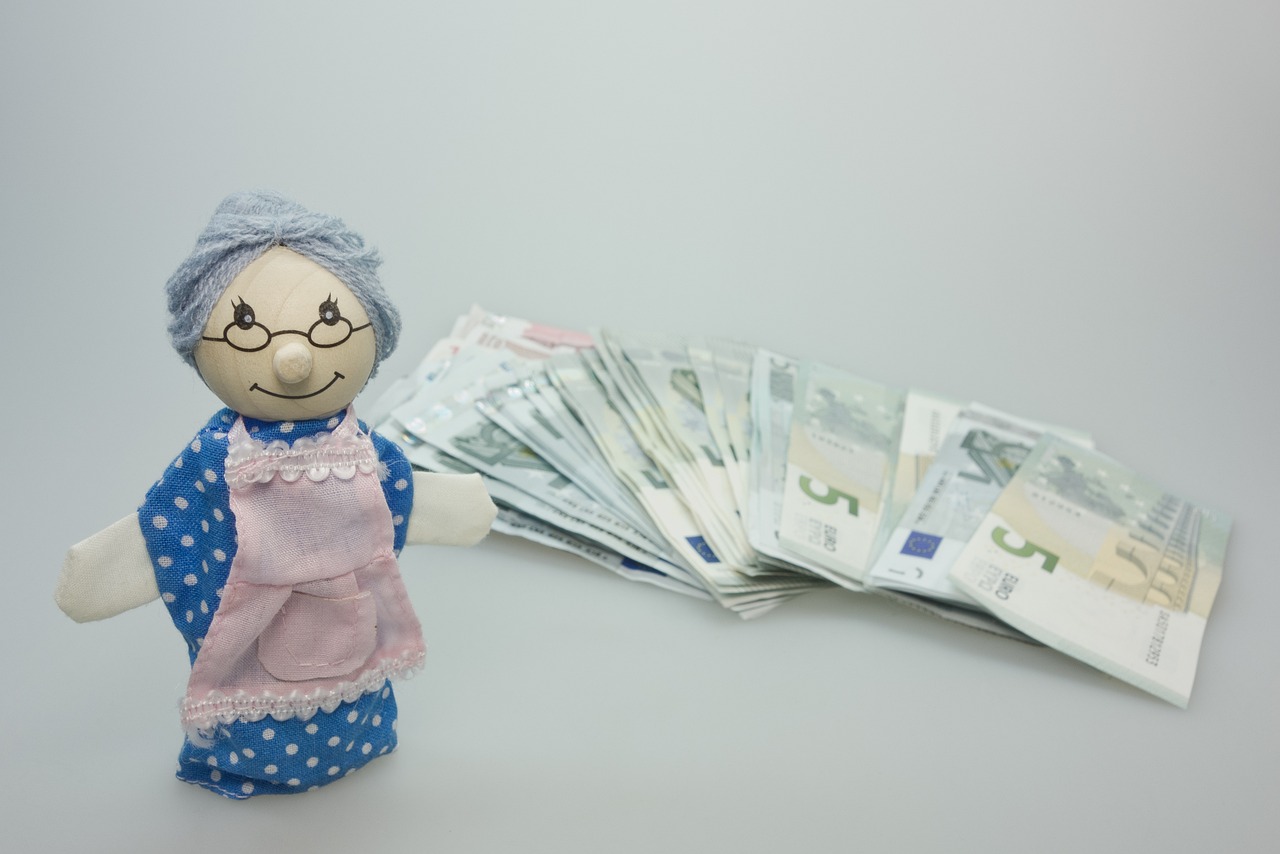 puppet, granny, children's toys, wood, to play, nostalgia, nostalgic, money, banknotes, euro, save up, savings book, pension, apron, pension cut, pension increase, pocket money, pension, pension, pension, pension, pension, pocket money